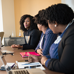 People having a discussion during a meeting
