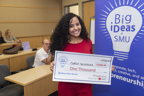 Mona with her big ideas check 