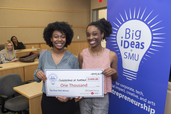 Brinn Bailey with her big ideas check