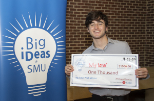 Big ideas winner Brandon Herman with his thousand dollar check