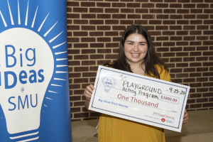 Alyssa with her big ideas check 