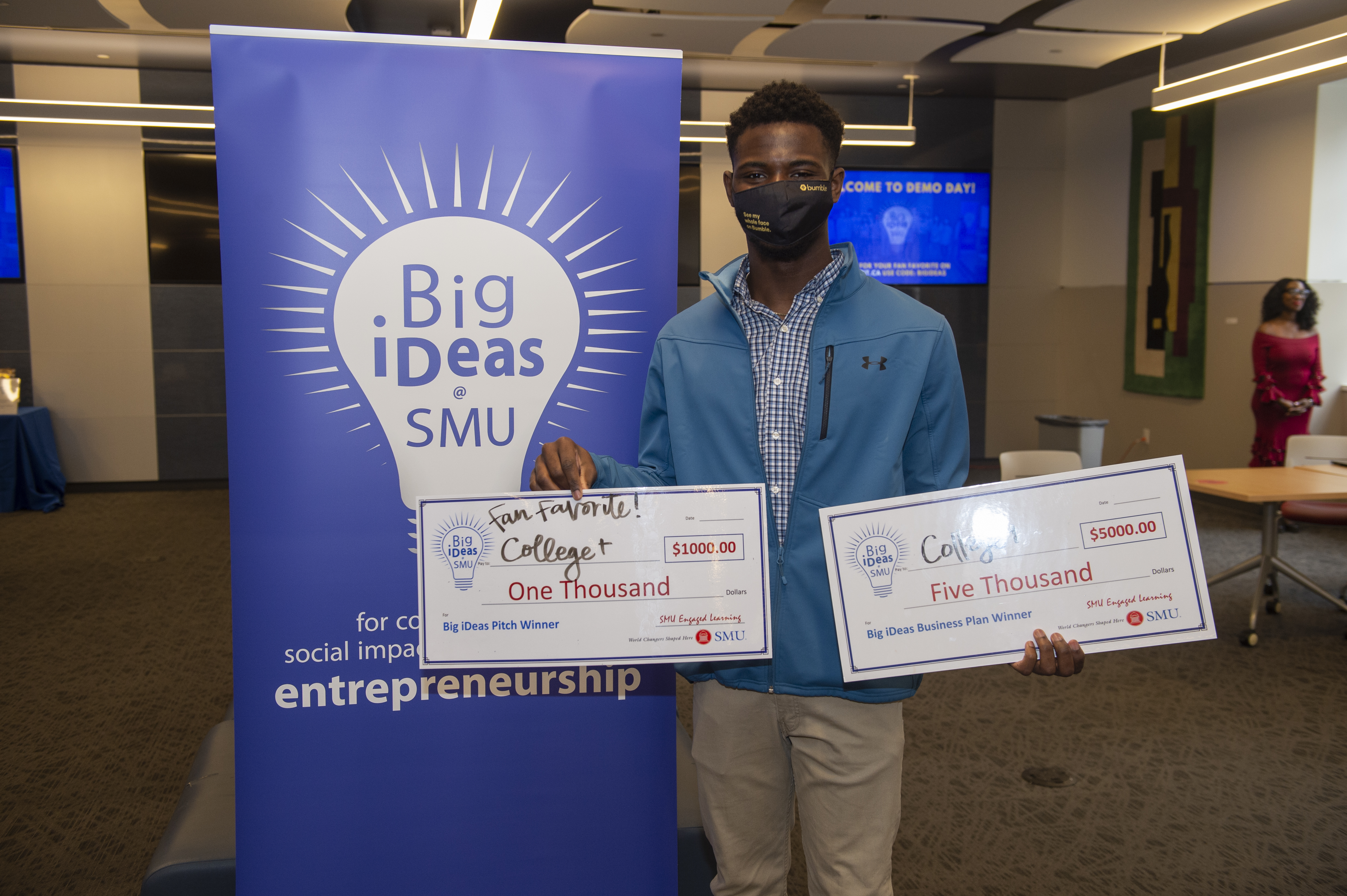 Big ideas winner Seun Suberu with his big check