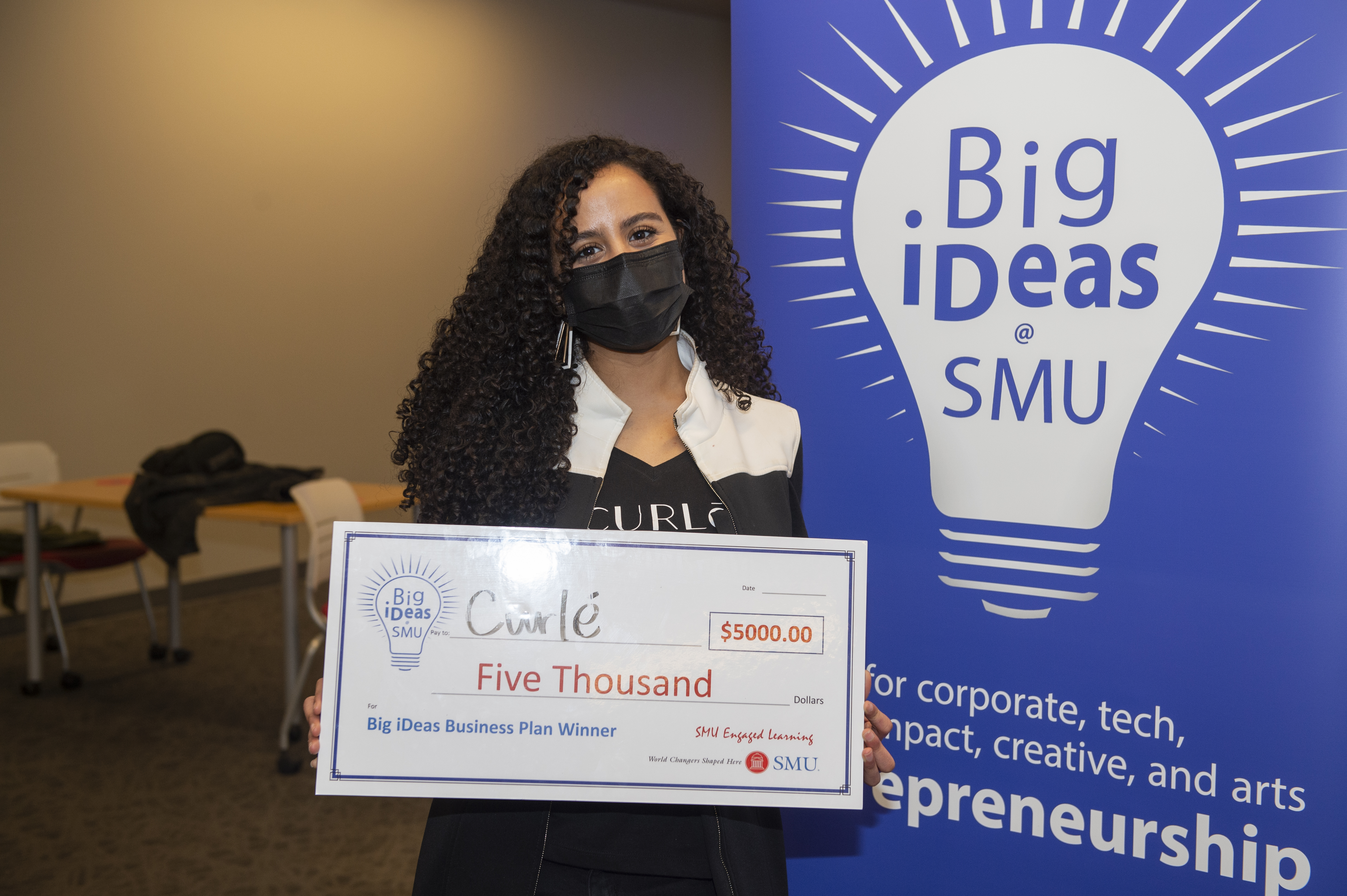 Big ideas winner Mona El-Gharby with her big check