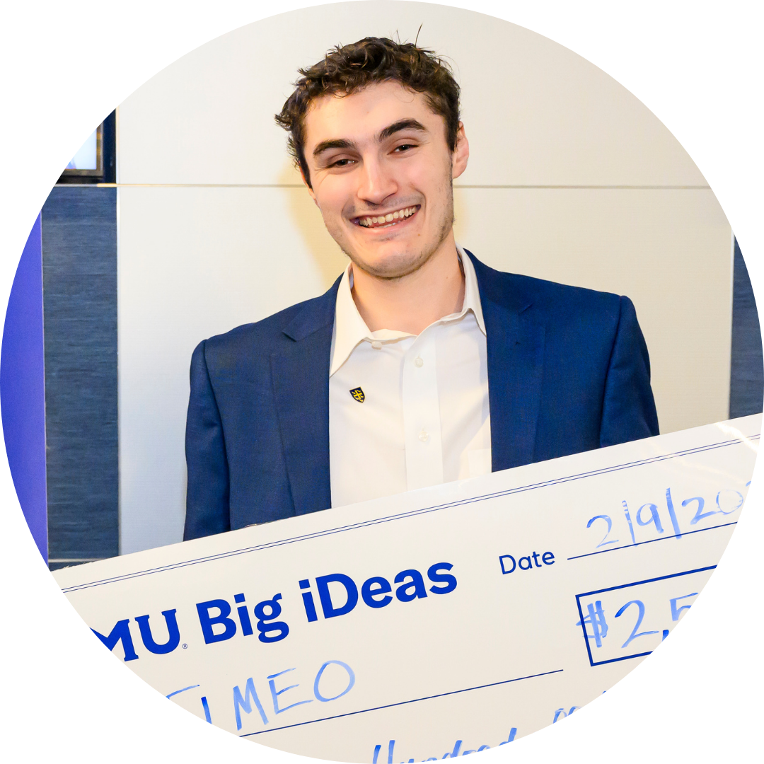 Timio News founder Joshua Baier with his big check