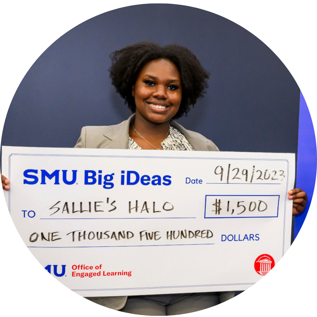 Kennedy Honors, founder of Sallie's Halo, with big check from Big iDeas