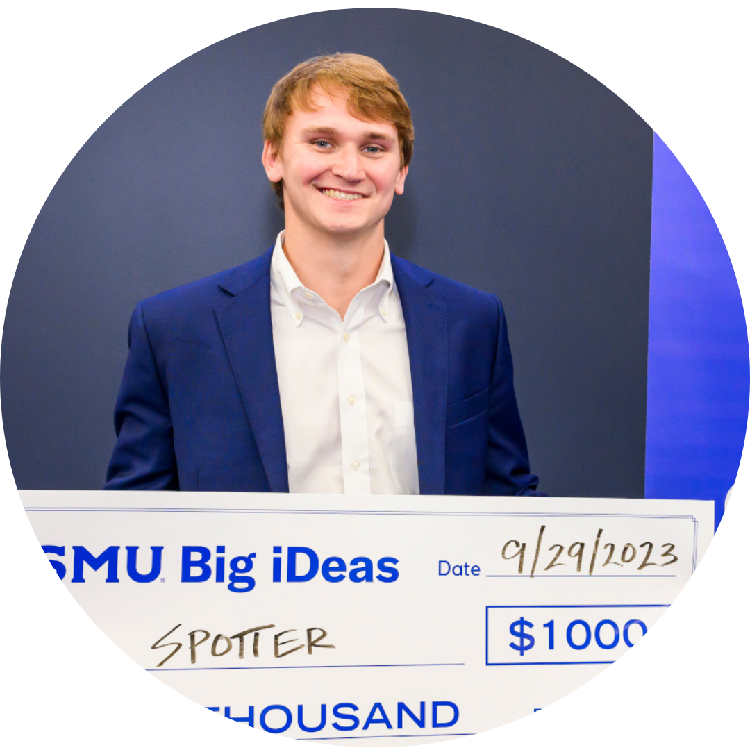 Nick Ludwig, founder of Spotter, with big check from Big iDeas