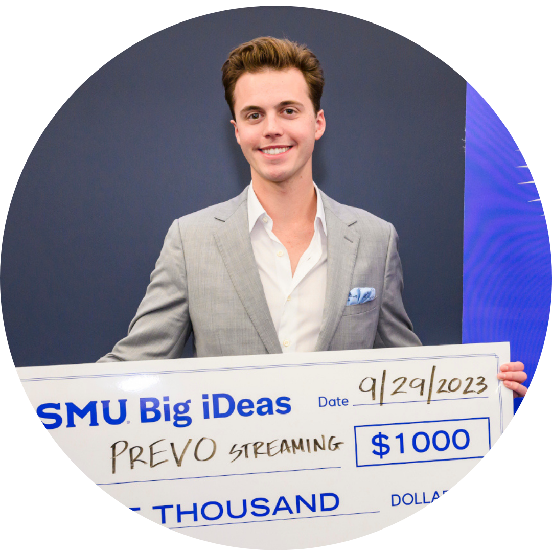 Ryder McNeal, founder of PREVO, with big check from Big iDeas