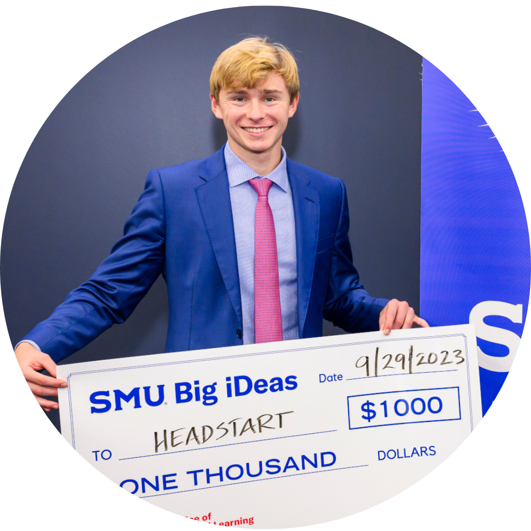 Speed Gregory, founder of Headstart, with big check from Big iDeas