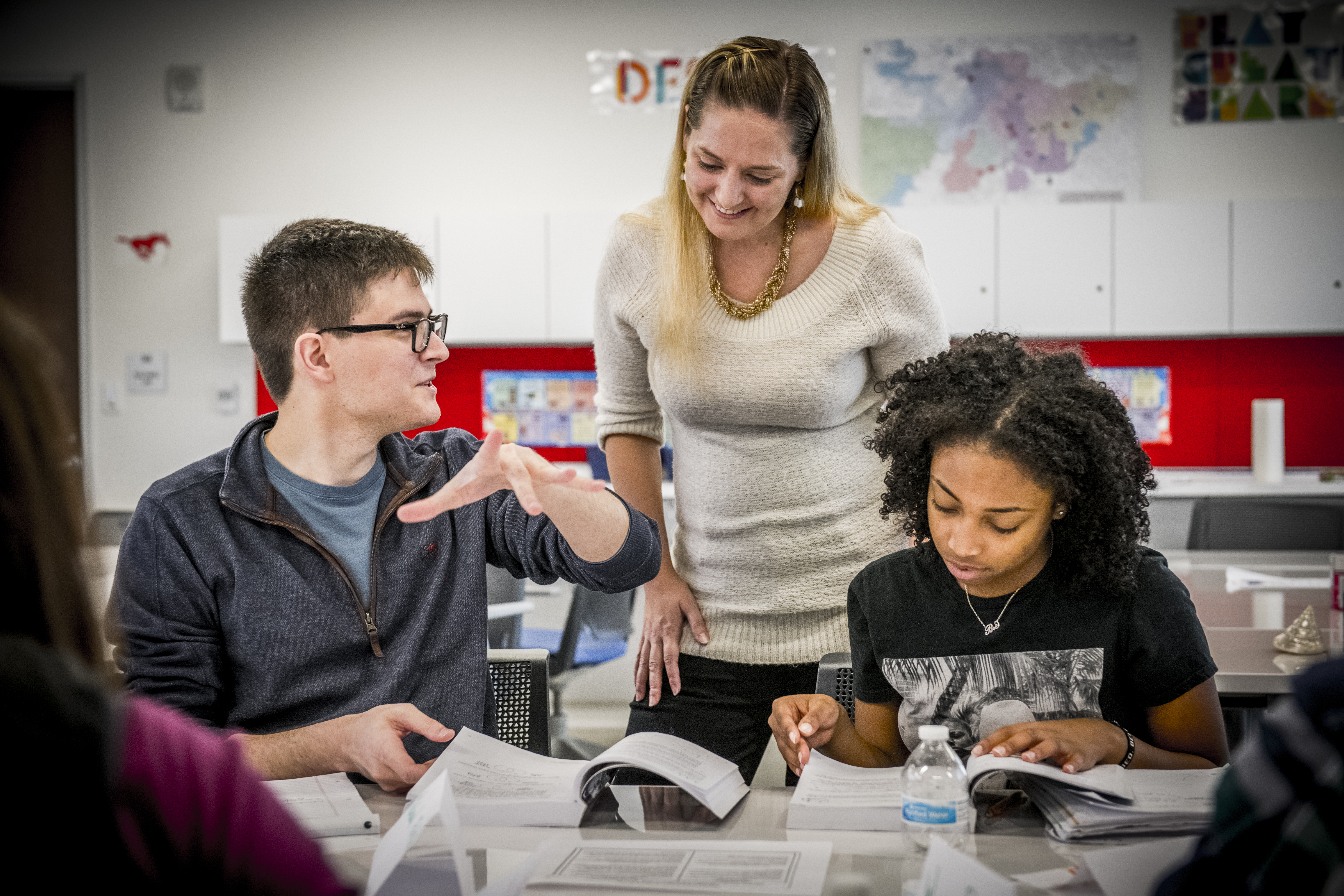 Students working with professor 