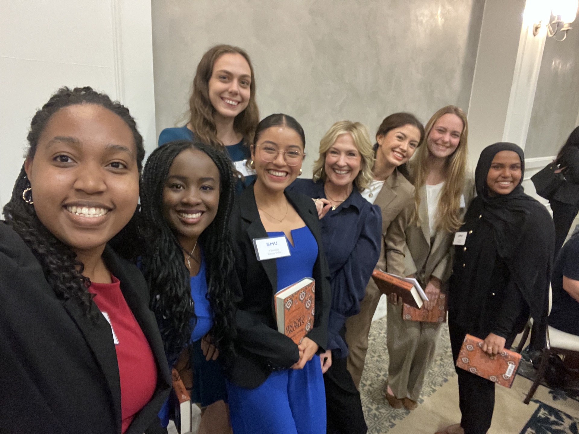 A group of female President's Scholars pose with Author Brene Brown, Tate Lecture Series Speaker