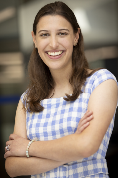 Dorie Beitchman wears a blue and white checkered patterned dress