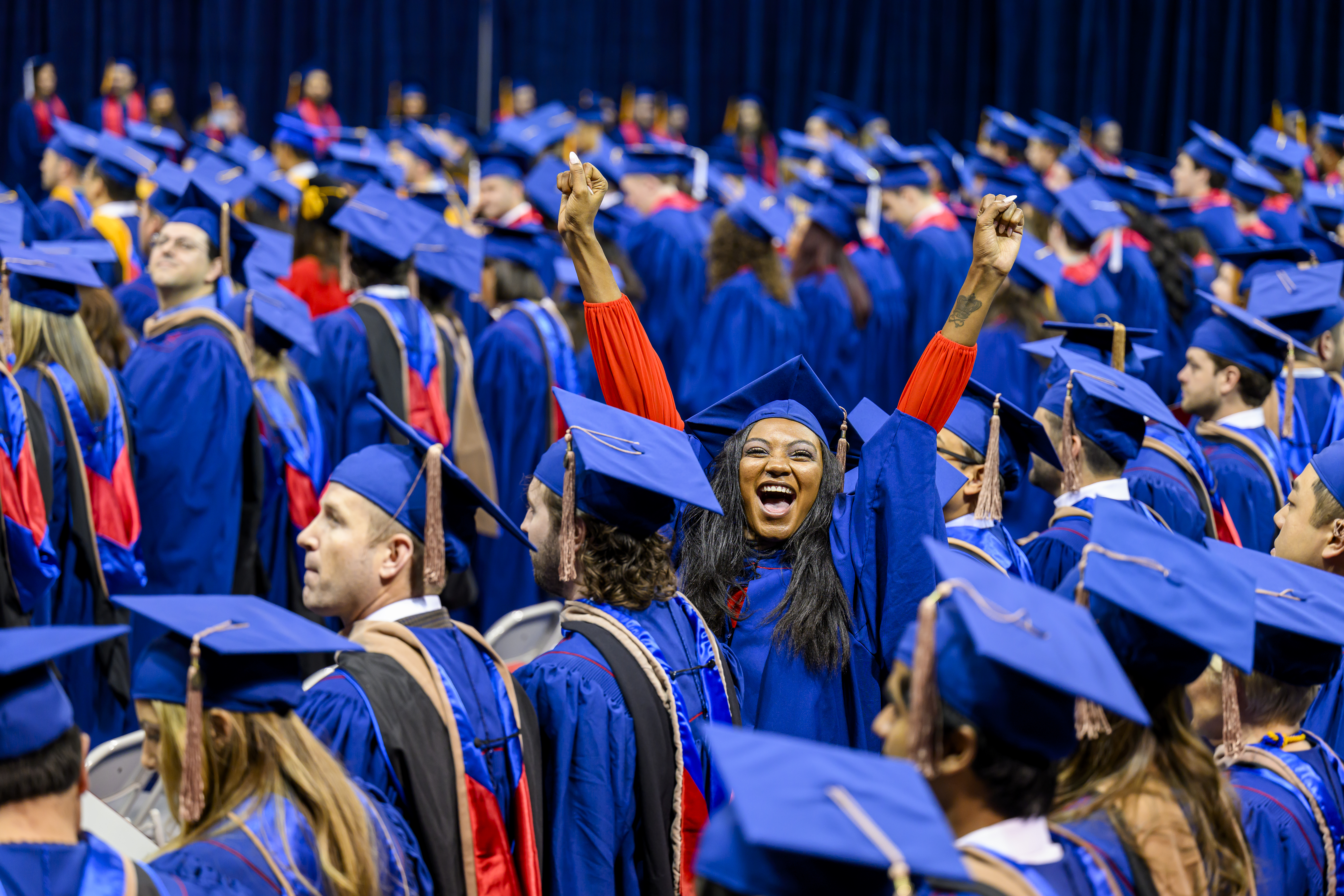 Student cheering at graduation