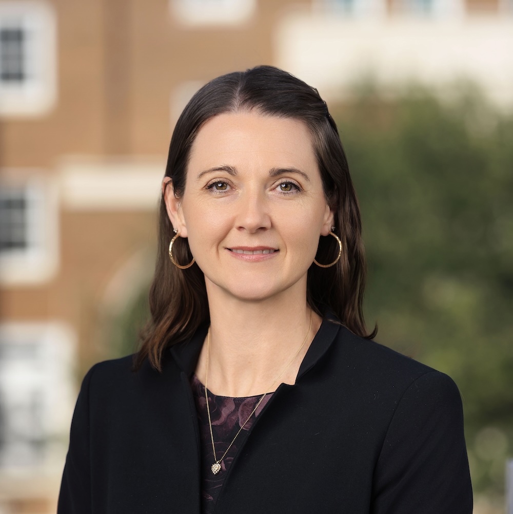 Headshot of Alicia Mohundro, Academic Advisor in the University Advising Center. Alicia has brown hair and a dark colored jacket in the picture.