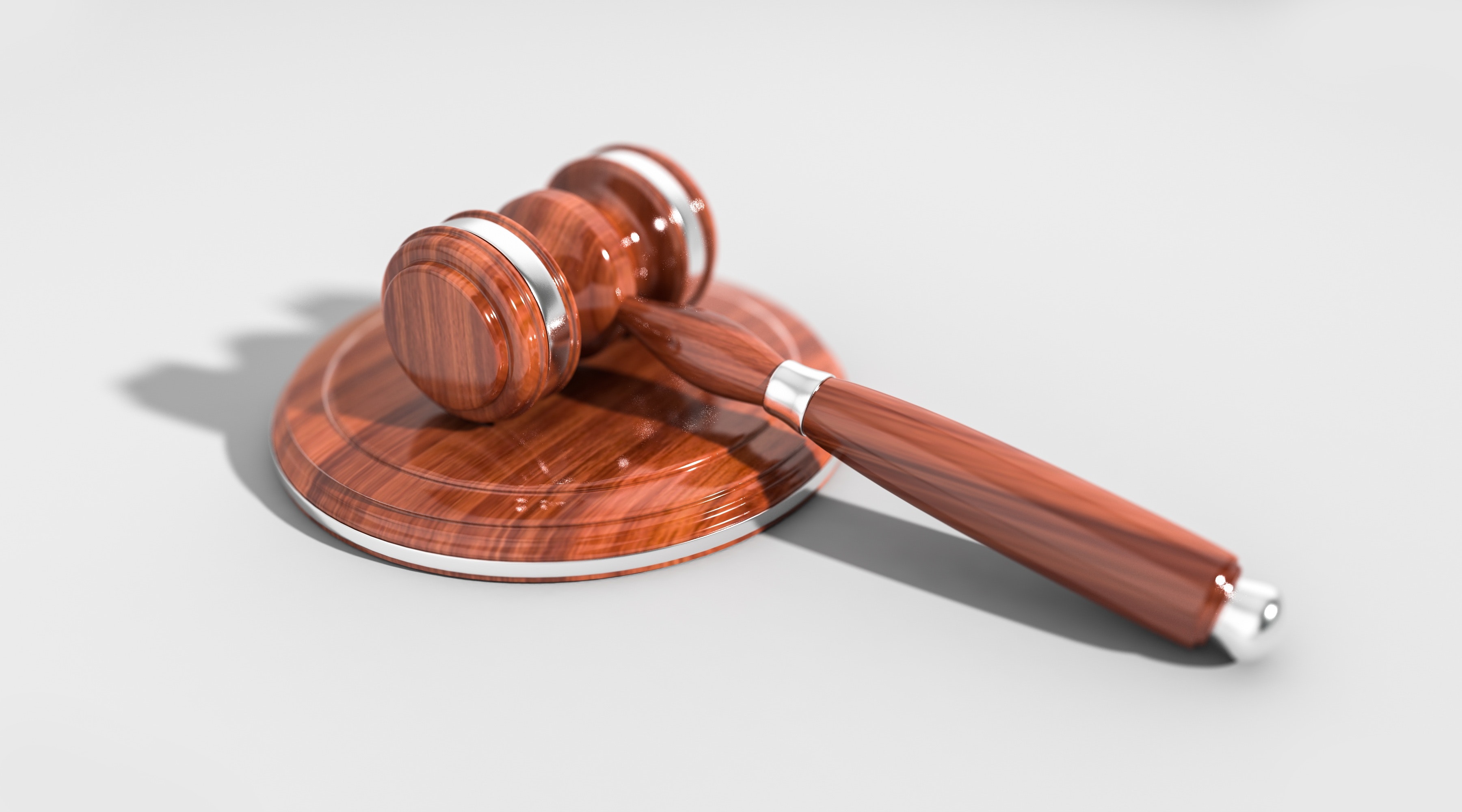 An image depicting a gavel used in legal proceedings.