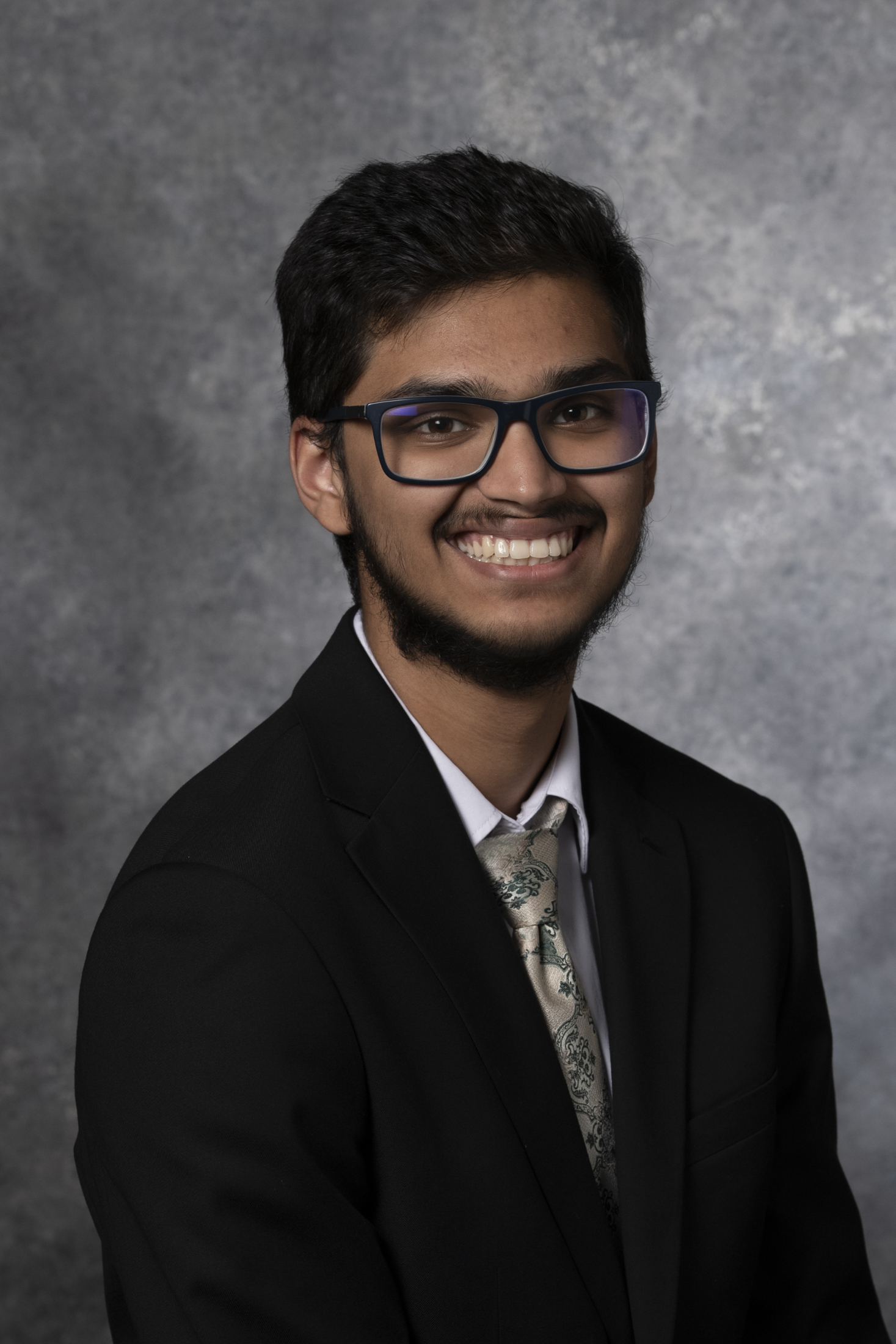Adhikari's headshot