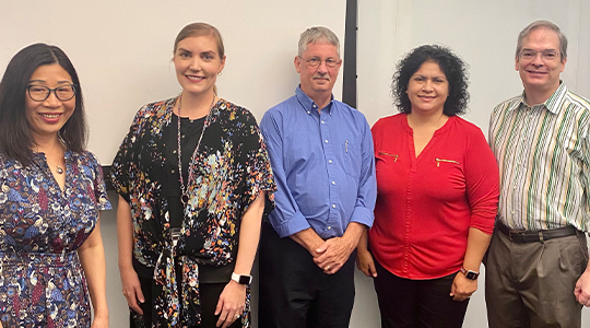 Teaching and Learning group photo with Dr. Dave Edyburn at Harold Clark Simmons Hall.
