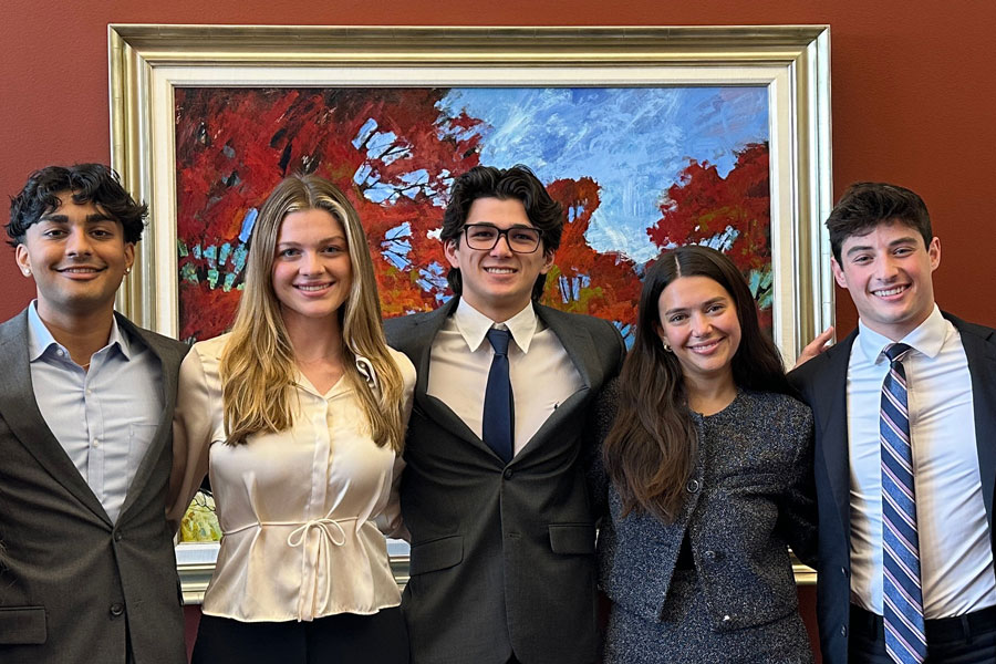 Five undergraduate Sport Management students pose for a photo, representing Simmons School at a national competition. Dev Dondra, Lily Hewitt, Aiden Millis, Lily Podolsky, Matthew Bloomenthal
