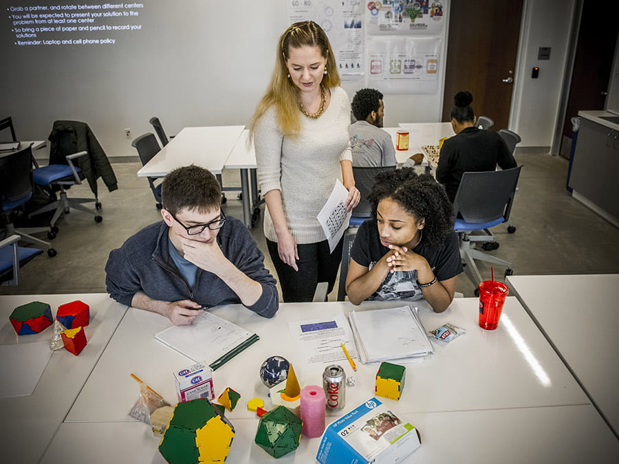 Simmons Teaching and Learning Faculty, Candace Walkington, teaches a class in Harold Clark Simmons Hall on the SMU Campus.