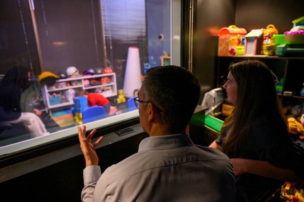 A student in SMU’s counseling master’s degree program trains in one of the play therapy labs.