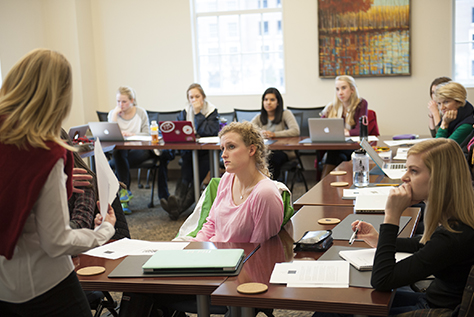 Professor instructing Simmons students