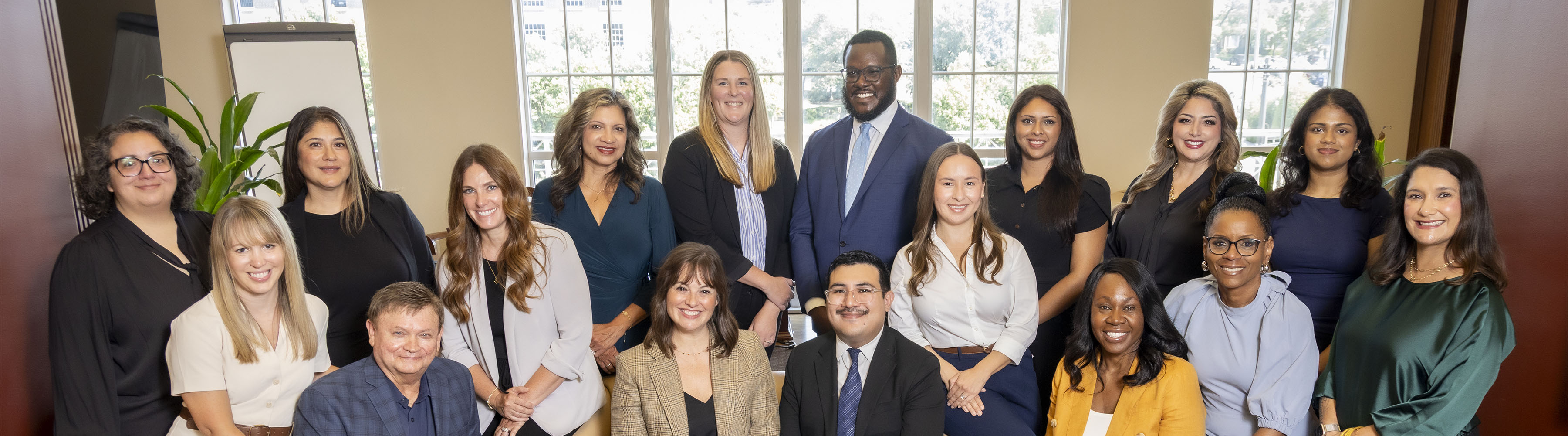 The Addy Foundation Center on Research and Evaluation (CORE) group photograph taken in the Annette Caldwell Simmons Hall Reading Room.