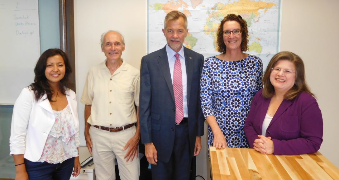 Teaching Education department  group photograph. From left to right: doctoral student Veronica Mellado De La Cruz, Professor Paul Yovanoff, Dean David Chard, Professor Stephanie Al Otaiba, and Professor Jill Allor