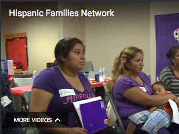 A group of Hispanic mothers participating in a workshop focused on sharing resources to boost children's kindergarten readiness.