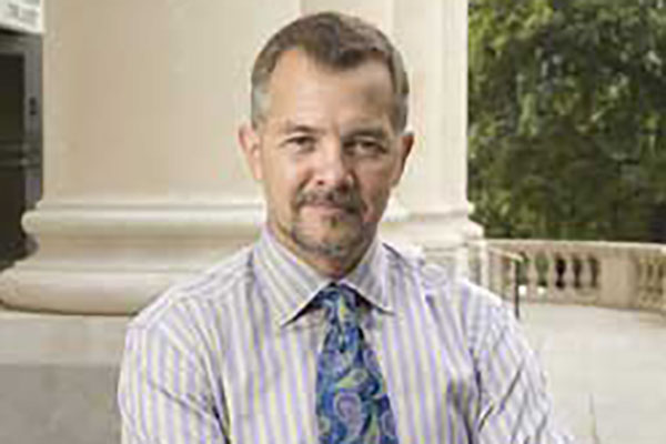 Headshot of Simmons School Dean David Chard