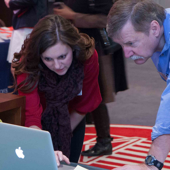 Working on laptop during RME conference