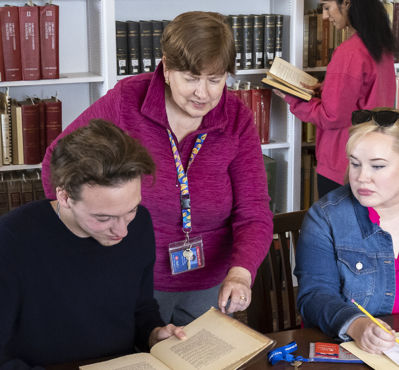 Joan Gosnell and people inside of the university archives center