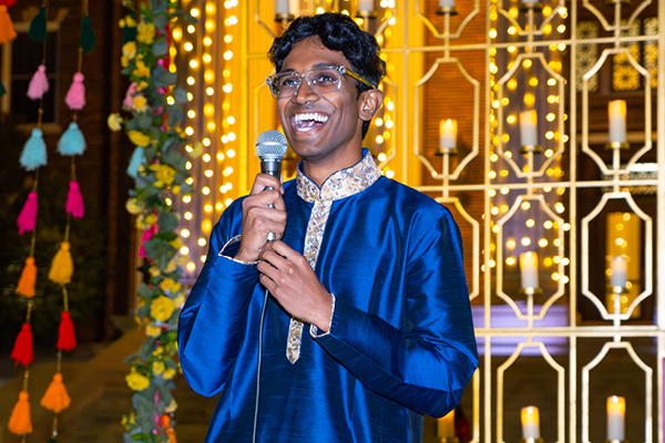 Student speaking at the Diwali celebration