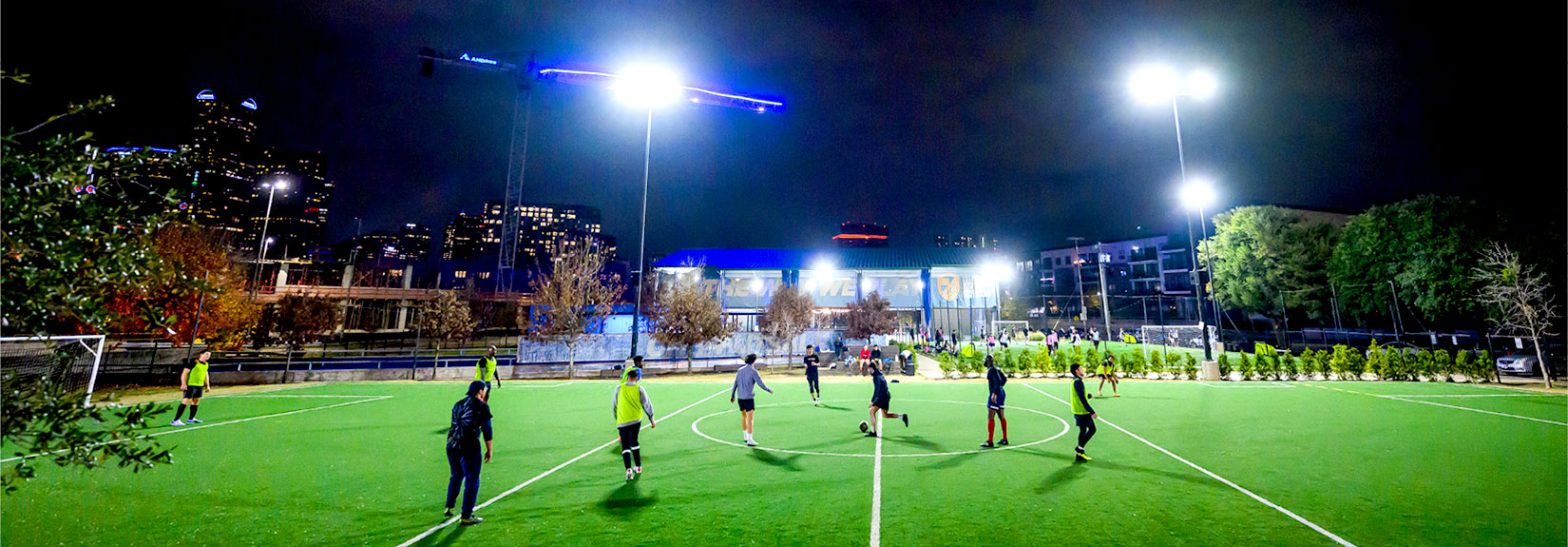Futsal players at night