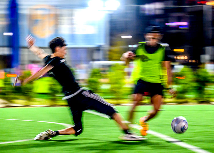 Futsal player steals the ball
