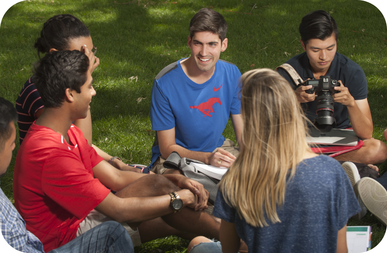 Students sitting on the quad