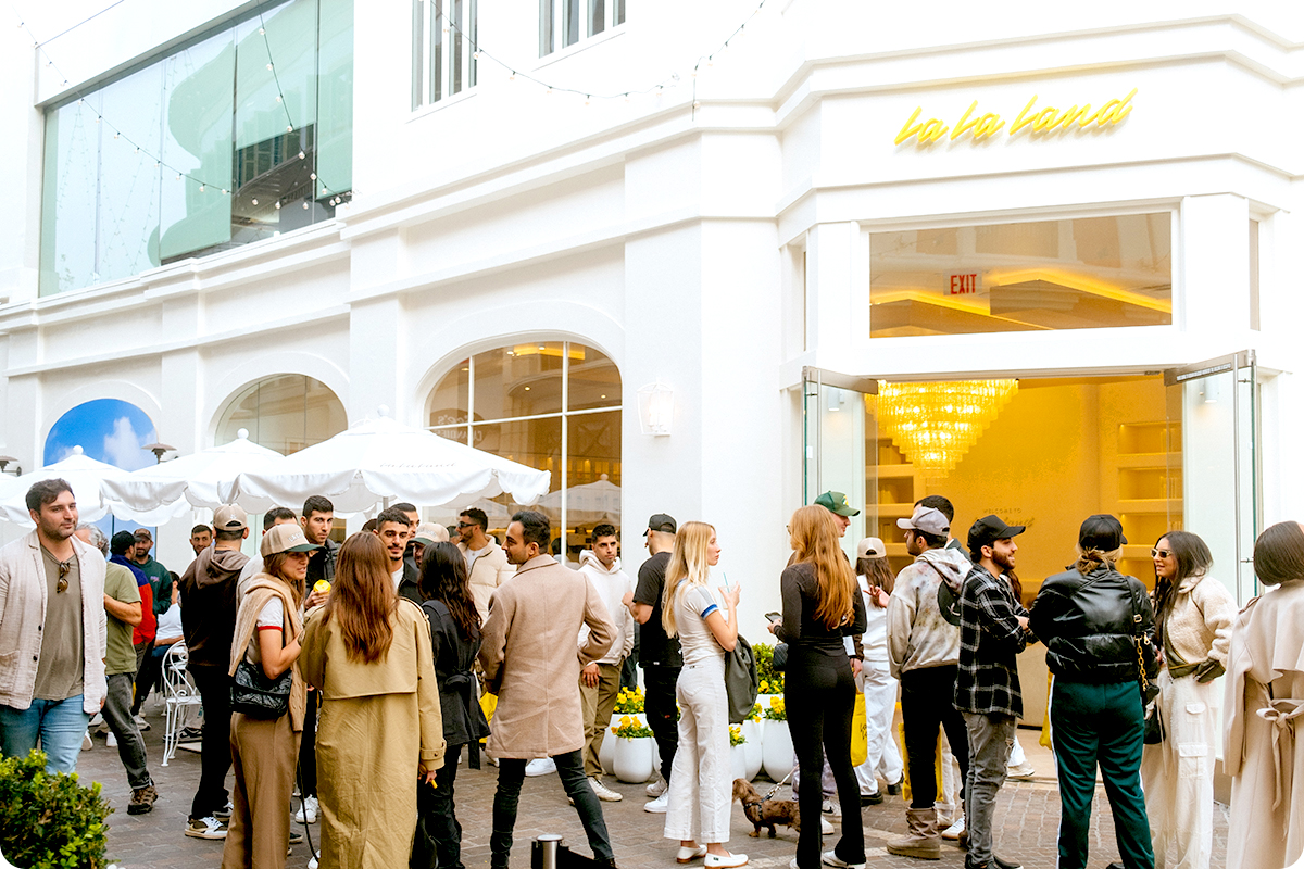 The opening of the Santa Monica La La Land Kind Café was so well attended that crowds of people spilled outside its bright white doors.
