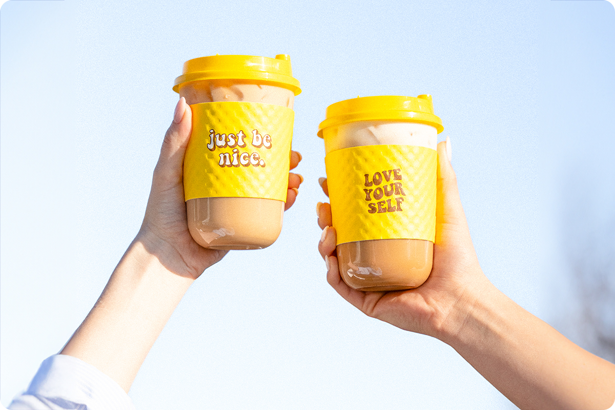 Cup sleeves at La La Land Kind Café have slogans such as “Just be nice,” and “Love yourself,” which speak to Cox School of Business alum Francois Reihani’s focus on kindness initiatives.