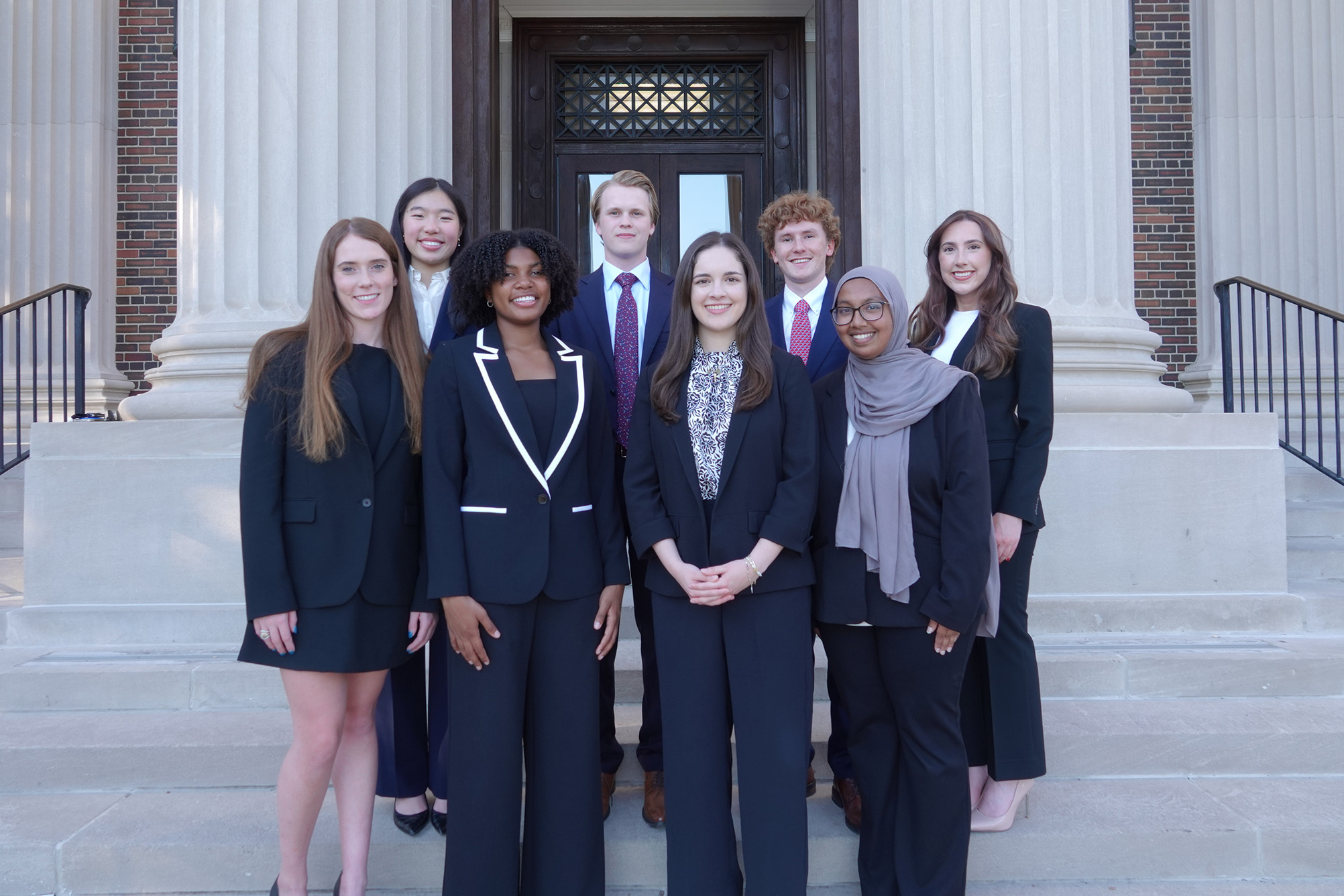 2025-2026 SMU Student Representative to the Board of Trustees, standing on stairs outside in front of building