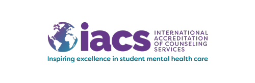 international accreditation of counseling services logo, purple letters with teal and purple world globe icon