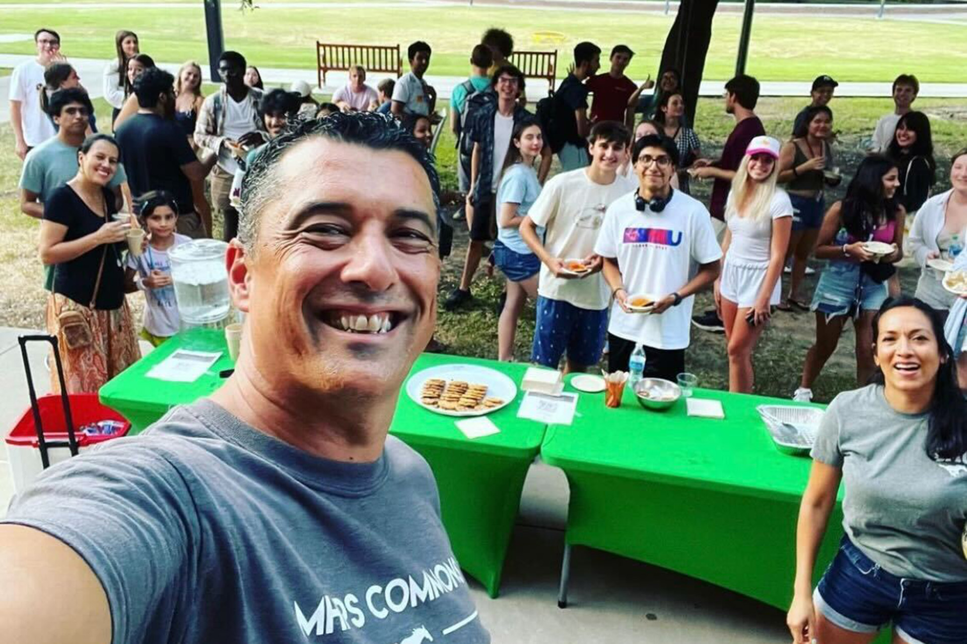 Dr. Alberto Pastor (Faculty-in-Residence) and MHPS students outside for TAPAS event