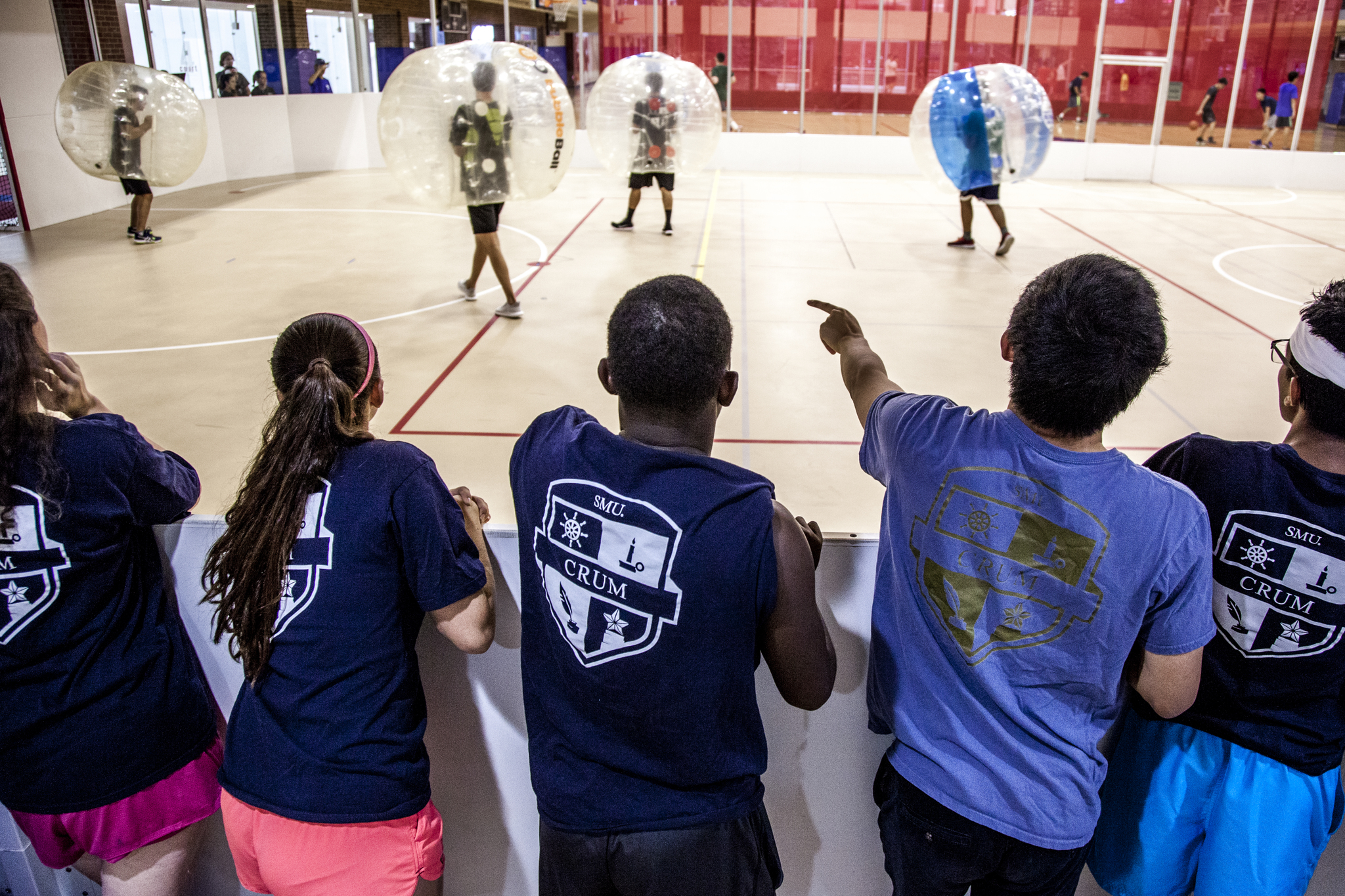 students playing bubble soccer