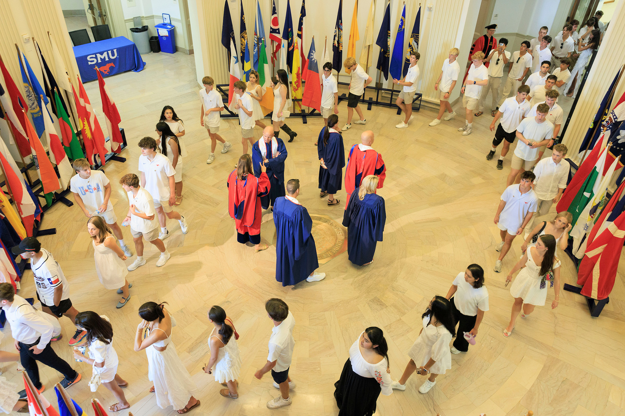 people walking through building