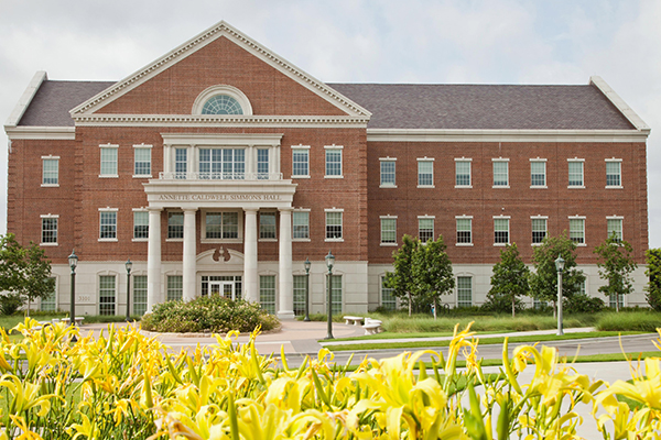 Simmons School of Education and Human Development and the Annette Caldwell Simmons Hall opens