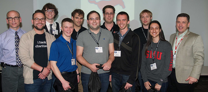 Southern Methodist University's National Collegiate Cyber Defense Competition team poses for a photo after 2014 regionals. The competition is part of Raytheon's nationwide effort to cultivate cyber talent in colleges.