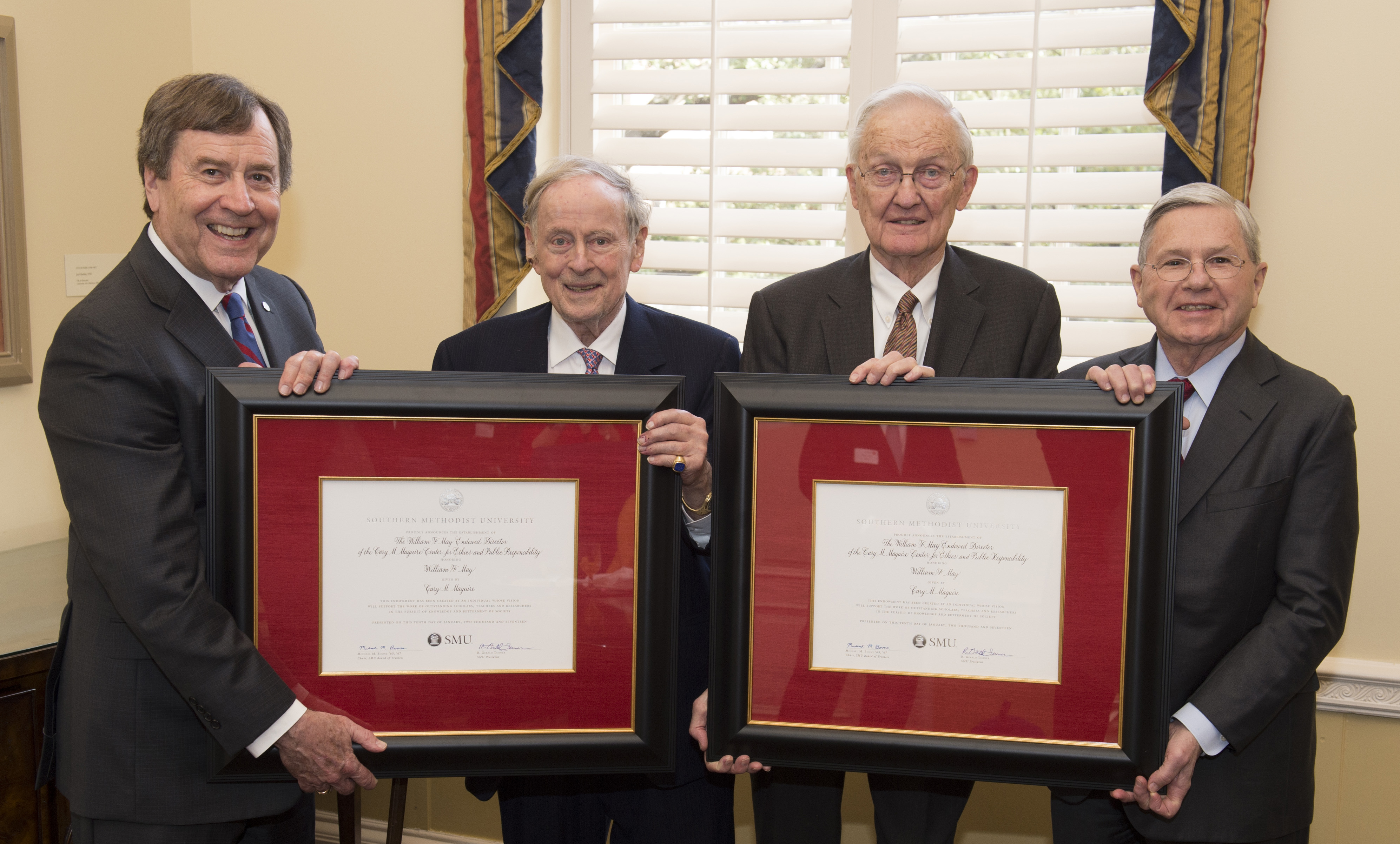 Left to right: President R. Gerald Turner, Cary M. Maguire, William F. May, Michael M. Boone.
