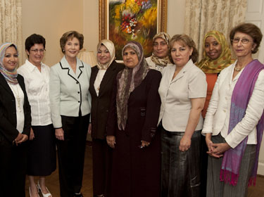 George and Laura Bush visit with Iraqi women at SMU