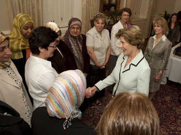 George and Laura Bush visit with Iraqi women at SMU