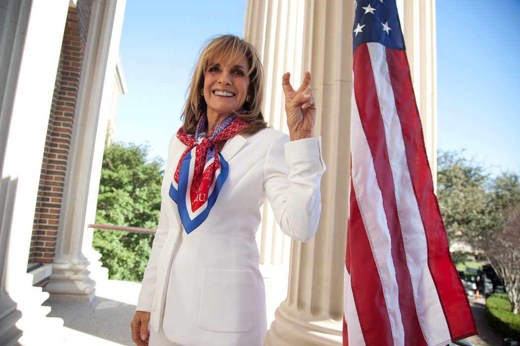 Actress Linda Gray gives the Pony Up sign