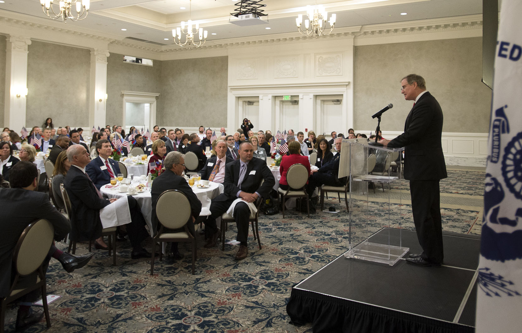 Retired Navy Admiral Patrick Walsh addresses a Veterans Day luncheon at SMU