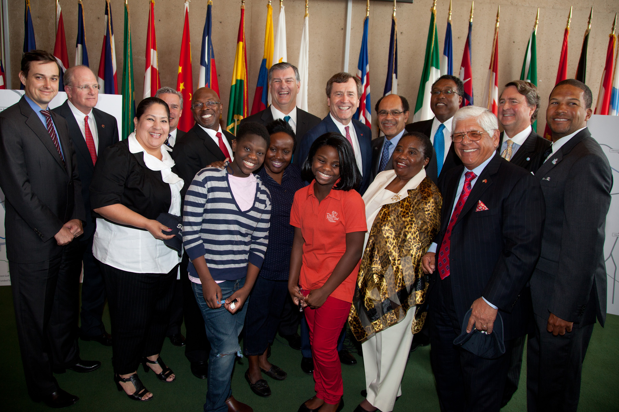 Officials from SMU, AT&T, and Dallas with members of The First Tee