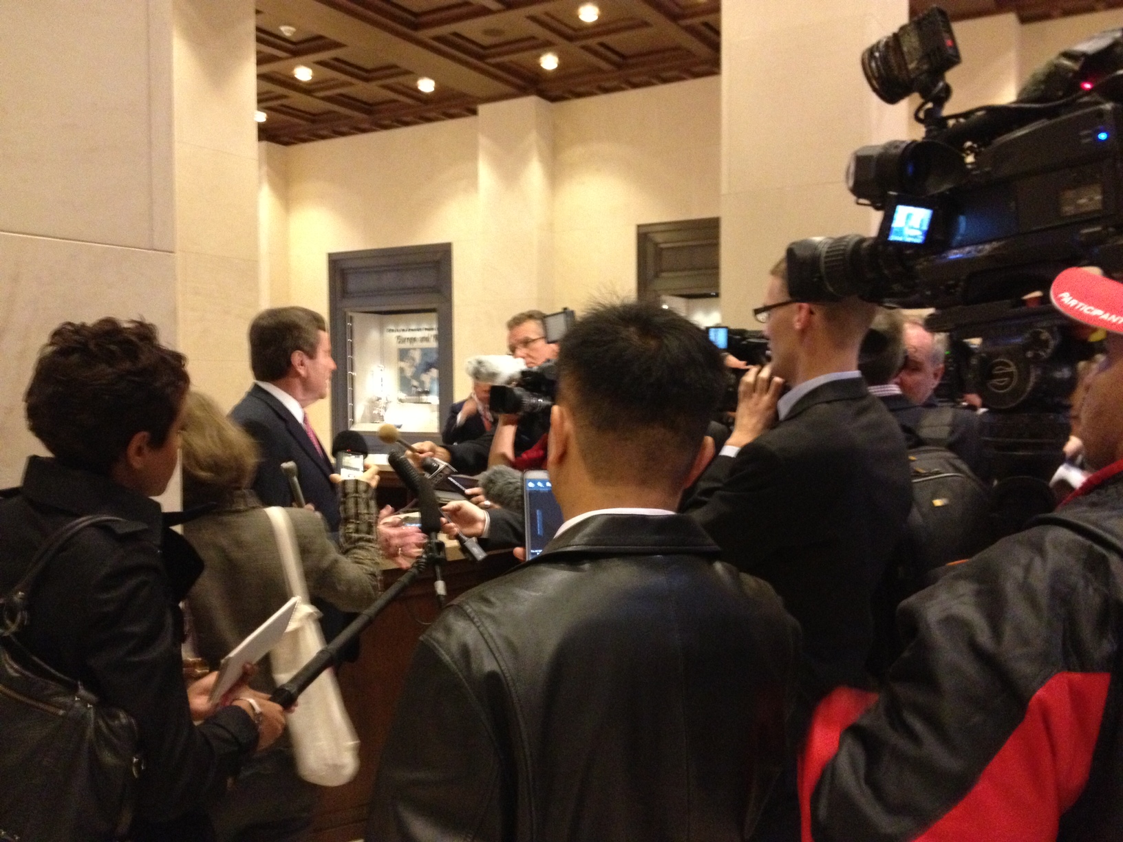 At a media preview tour of the George W. Bush Presidential museum April 24, SMU President R. Gerald Turner tells reporters how the Bush Center will benefit SMU.